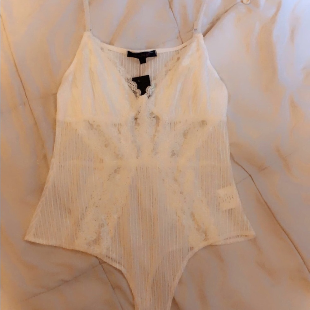 Sexy white lace bodysuit..